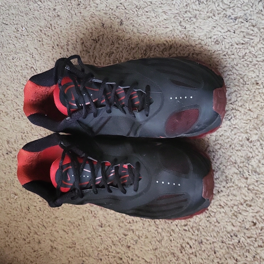 Black and red Nikes
